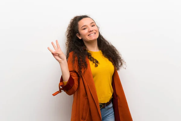 Adolescente Chica Con Abrigo Feliz Contar Tres Con Los Dedos —  Fotos de Stock