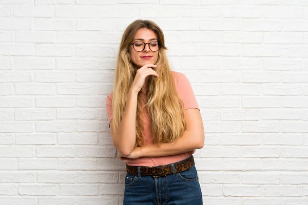 Young Blonde Woman White Brick Wall Glasses — Stock Photo, Image