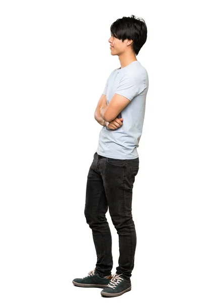 Eine Ganzkörperaufnahme Eines Asiatischen Mannes Mit Blauem Hemd Seitenlage Über — Stockfoto