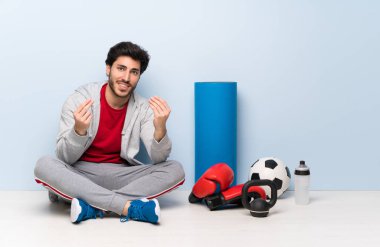 Spor adam yerde para jest yapma oturuyor