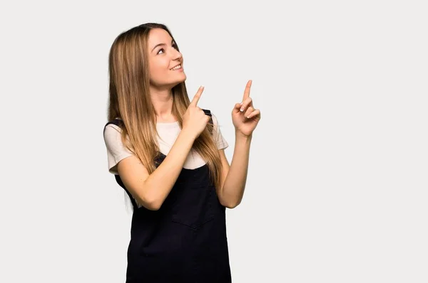 Young Pretty Woman Pointing Index Finger Looking Isolated Grey Background — Stock Photo, Image