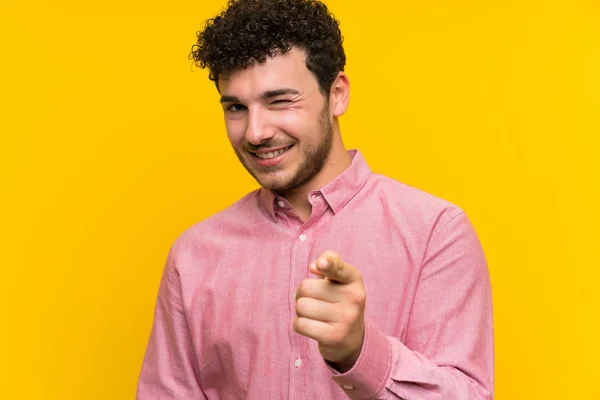 Man Curly Hair Isolated Yellow Wall Points Finger You — Stock Photo, Image