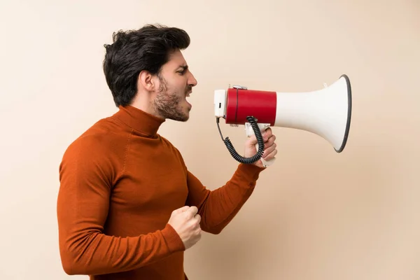 Handsome Isolated Wall Shouting Megaphone — Stock Photo, Image