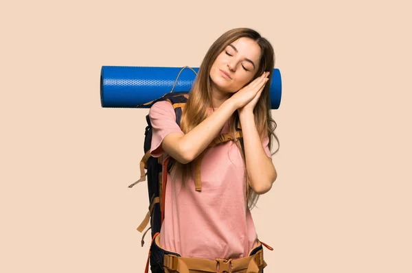 Young Backpacker Woman Making Sleep Gesture Dorable Expression Isolated Yellow — Stock Photo, Image