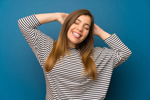 Young girl with striped shirt laughing