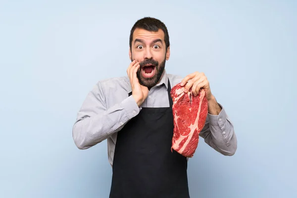 Chef Sosteniendo Una Carne Cruda Con Sorpresa Expresión Facial Conmocionada —  Fotos de Stock