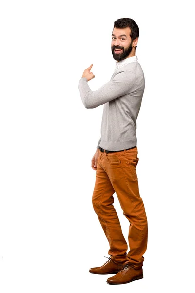 Yakışıklı Adam Izole Beyaz Arka Plan Üzerinde Geri Işaret — Stok fotoğraf