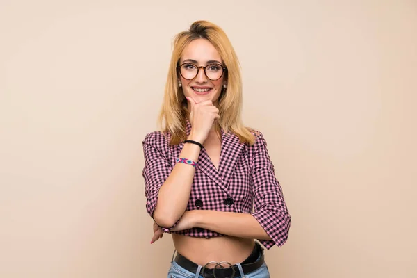 Young Blonde Woman Pink Jacket Isolated Wall Glasses Smiling — 스톡 사진