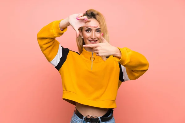 Young Blonde Woman Isolated Pink Background Focusing Face Framing Symbol — Stock Photo, Image