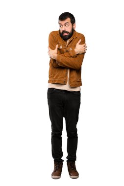 İzole beyaz arka plan üzerinde sakal donma ile yakışıklı adam