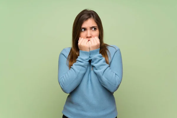 Young Girl Green Wall Nervous Scared Putting Hands Mouth — Stock Photo, Image