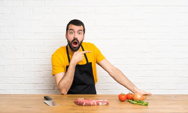 Chef Holding Cuisine Surprised Pointing Side — Stock Photo, Image
