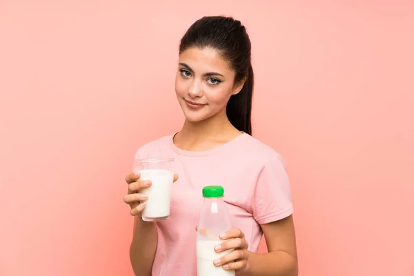 Teenager Girl Isolated Pink Wall Having Breakfast Milk — Stock Photo, Image