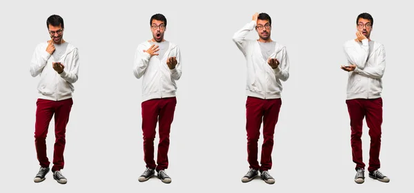 Set van brunette man met met mobiele over geïsoleerde achtergrond — Stockfoto