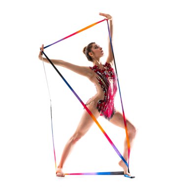 Kurdele ile ritmik jimnastik yaparken kız