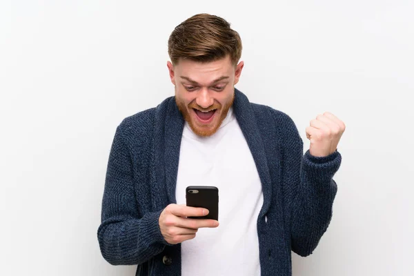 Redhead man with mobile — Stock Photo, Image