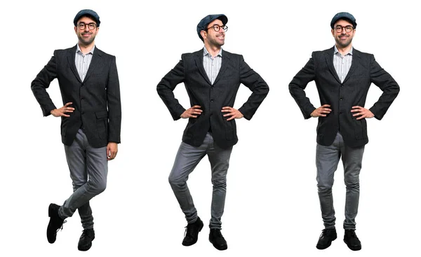 Set van knappe moderne man met baret en glazen poseren met ar — Stockfoto