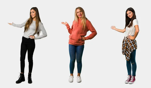 Set Women Pointing Back Presenting Product — Stock Photo, Image