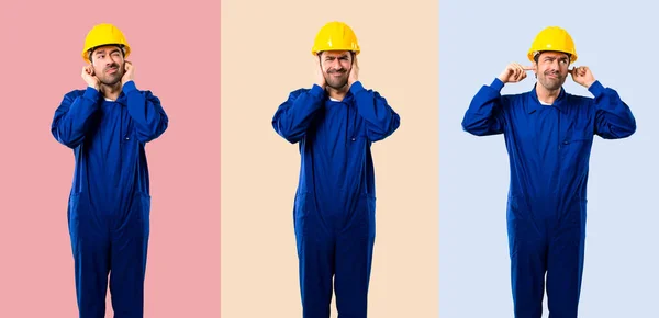Set Young Workman Helmet Covering Both Ears Hands Frustrated Expression — Stock Photo, Image