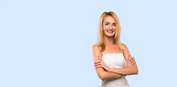 Young Blonde Woman Keeping Arms Crossed Frontal Position Isolated Blue — 스톡 사진