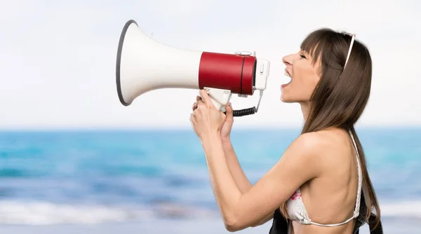 Young Woman Bikini Shouting Megaphone Beach — ストック写真