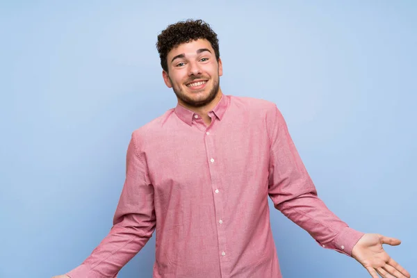 Man Curly Hair Isolated Blue Wall Smiling — Stock Photo, Image