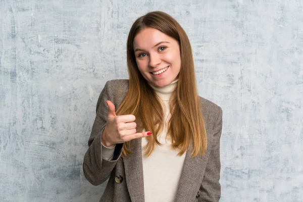 Young Woman Grunge Wall Making Phone Gesture — 스톡 사진