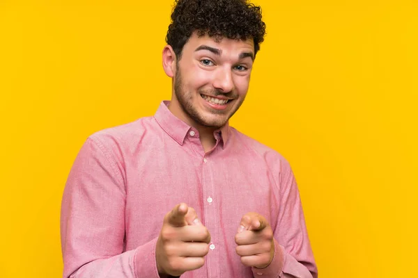 Man Curly Hair Isolated Yellow Wall Points Finger You — Stock Photo, Image