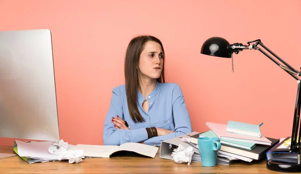 Young student girl with confuse face expression