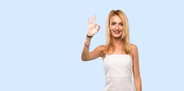 Young Blonde Woman Showing Sign Fingers Isolated Blue Background — 스톡 사진