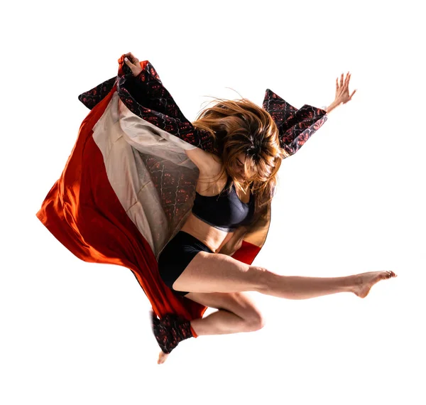 Young dance girl with kimono jumping — Stock Photo, Image