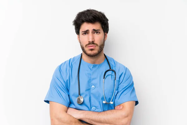 Chirurg Arzt Mann Über Isolierte Weiße Wand Traurig — Stockfoto