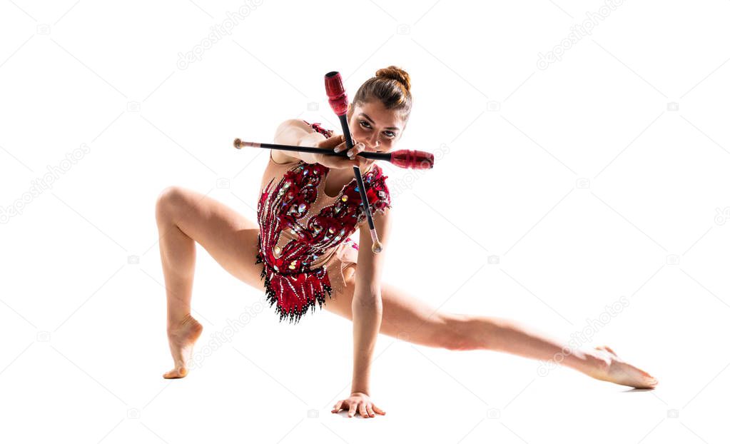 Girl doing rhythmic gymnastics with mace