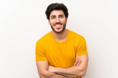 Izole beyaz duvar gülme üzerinde Yakışıklı