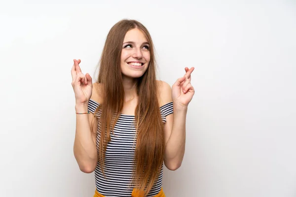 Young Woman Long Hair Isolated White Wall Fingers Crossing Wishing — Stock Photo, Image