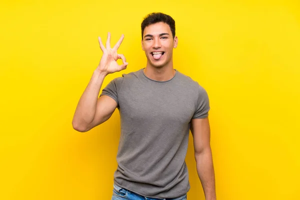 Handsome Man Isolated Yellow Wall Showing Sign Fingers — Stock Photo, Image