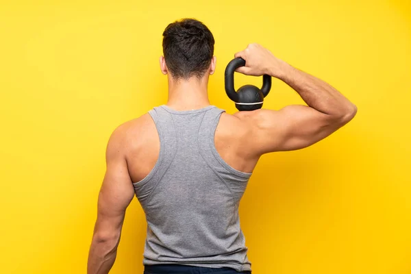 Bello Sport Uomo Sfondo Isolato Con Kettlebell — Foto Stock