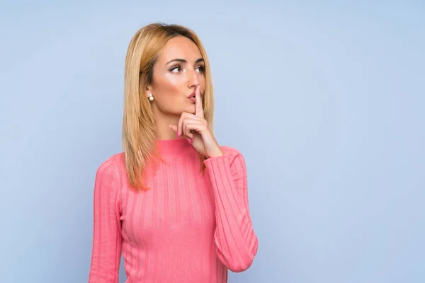 Young Blonde Woman Pink Sweater Isolated Blue Background Doing Silence — Stock Photo, Image
