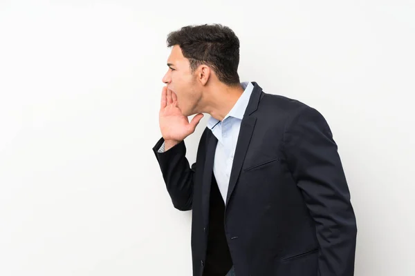 Hombre Guapo Sobre Pared Blanca Aislada Gritando Con Boca Abierta — Foto de Stock