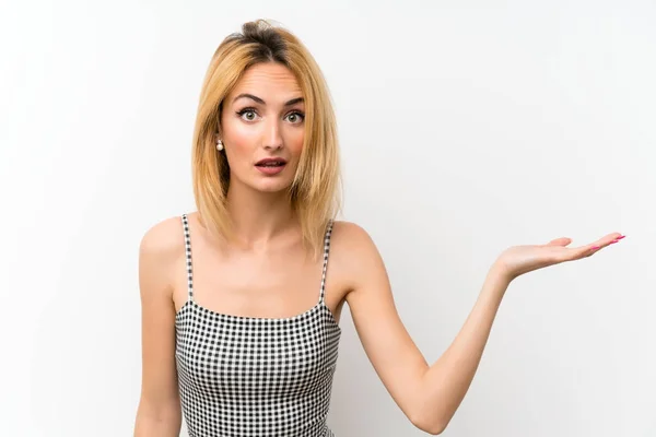 Young Blonde Woman Isolated White Making Doubts Gesture — Stock Photo, Image