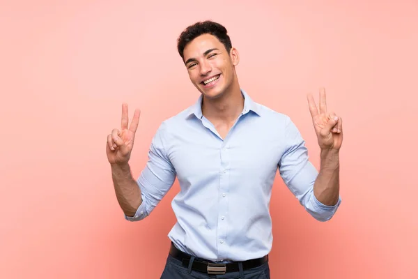 Handsome Man Pink Background Showing Victory Sign Both Hands — Stock Photo, Image