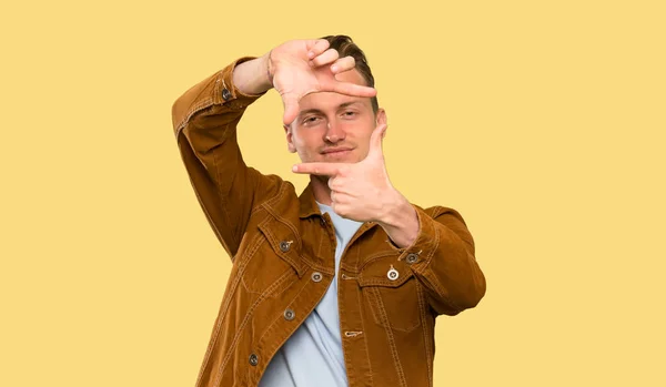 Blonde Handsome Man Focusing Face Framing Symbol — Stock Photo, Image