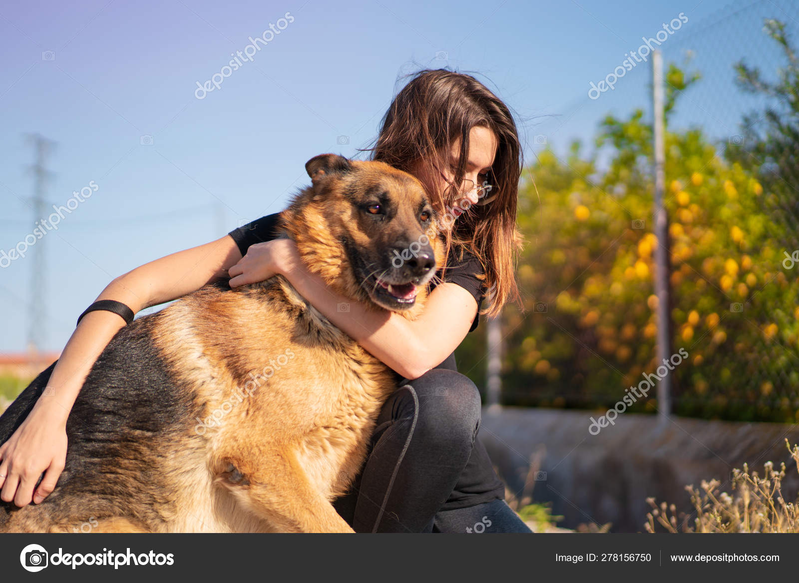 Young Girl Outdoors Hugging Her German Shepherd Dog — Stock Photo