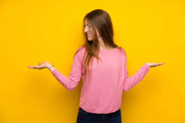 Young Woman Long Hair Isolated Yellow Wall Holding Copyspace Two — ストック写真