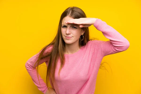 Young Woman Long Hair Isolated Yellow Wall Looking Far Away — Stock Photo, Image