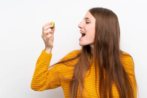 Fiatal nő hosszú haja macaroons — Stock Fotó