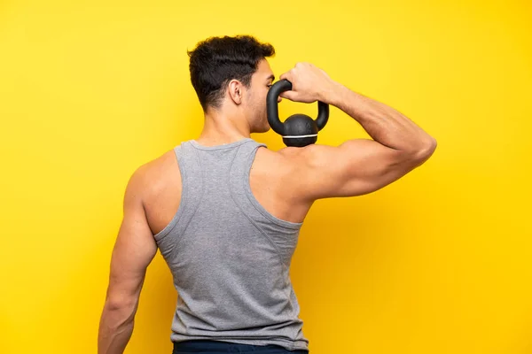 Bello Sport Uomo Sfondo Isolato Con Kettlebell — Foto Stock