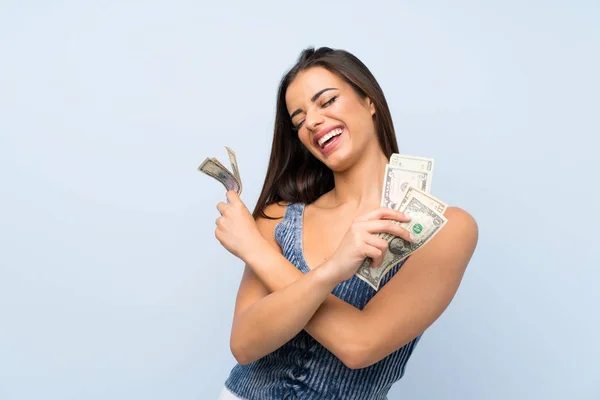 Young Woman Isolated Blue Wall Taking Lot Money — Stock Photo, Image