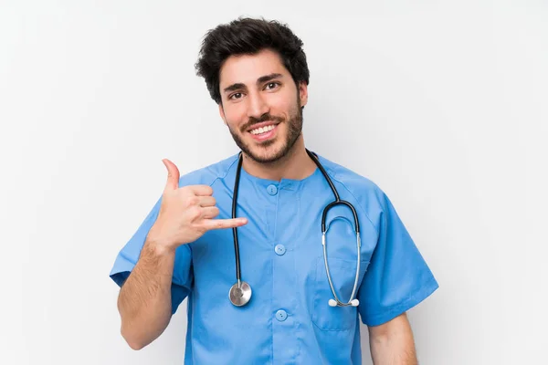 Cirujano Doctor Hombre Sobre Aislado Blanco Pared Haciendo Gesto Teléfono —  Fotos de Stock