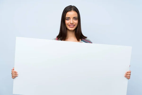 Young Woman Isolated Blue Wall Holding Empty White Placard Insert — Stock Photo, Image